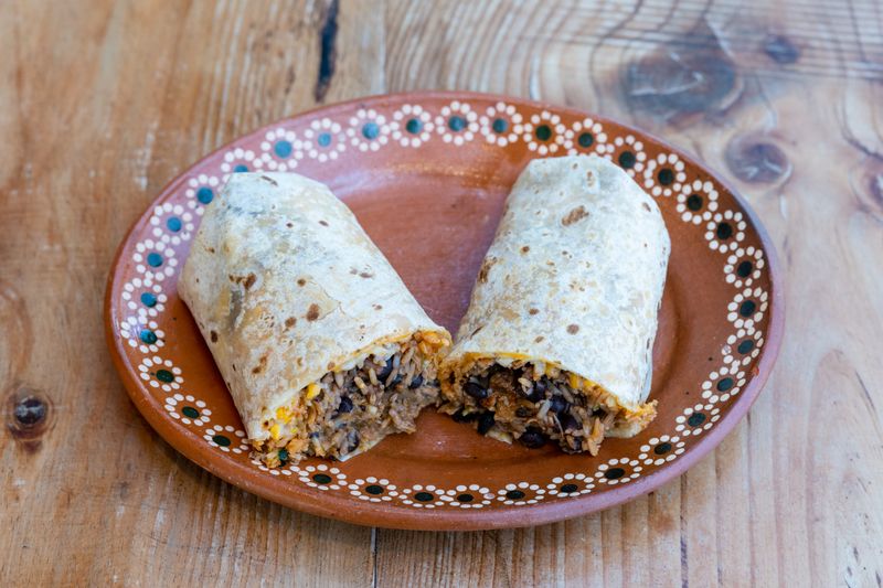 Chuys burrito grande with rice and beans