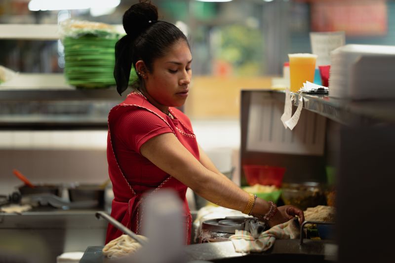 Chuys chuy's kitchen team preparing authentic Tex-Mex dishes